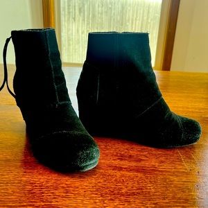 Black suede high ankle wedge booties.